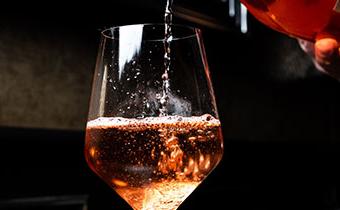 Wine being poured in a glass